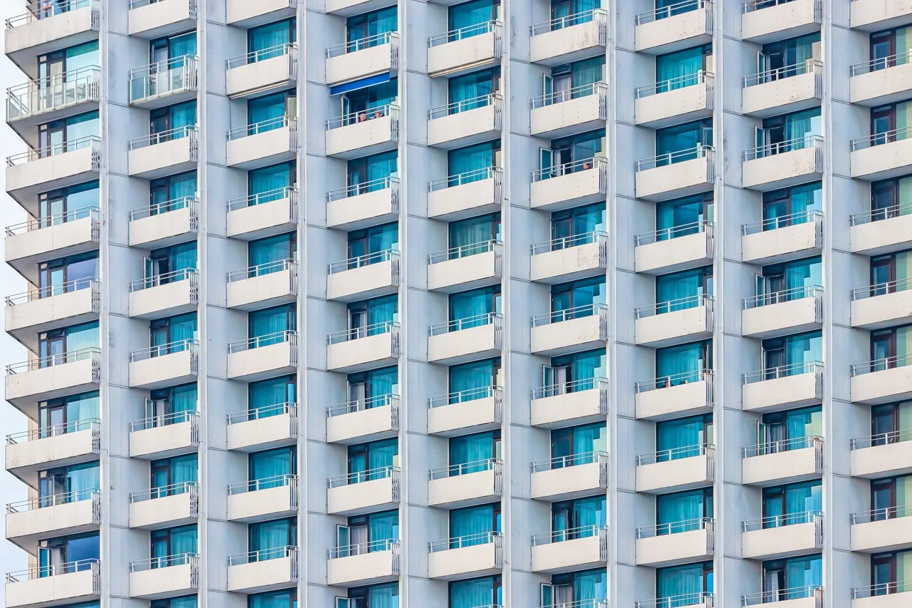 skyscraper, block of flats, building, architecture, townhouse, balcony, house, window, apartments, building, building, building, building, building, house, house, house, window, apartments. Apartment EV charger asset register: what to record before 2027