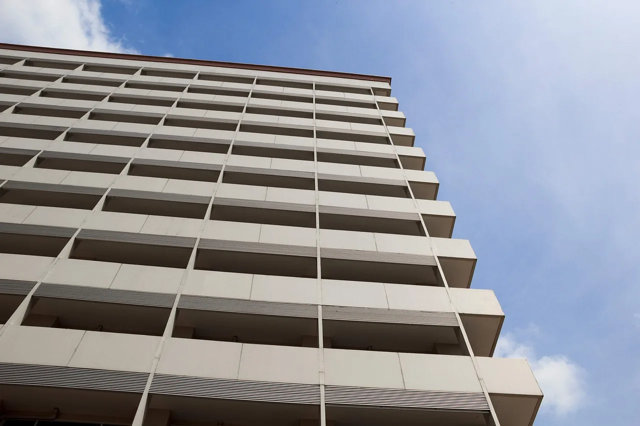 building, architecture, skyscraper, apartment, height, facade, exterior, urban, city. Apartment EV charger work orders: how to log a request without diagnosing it