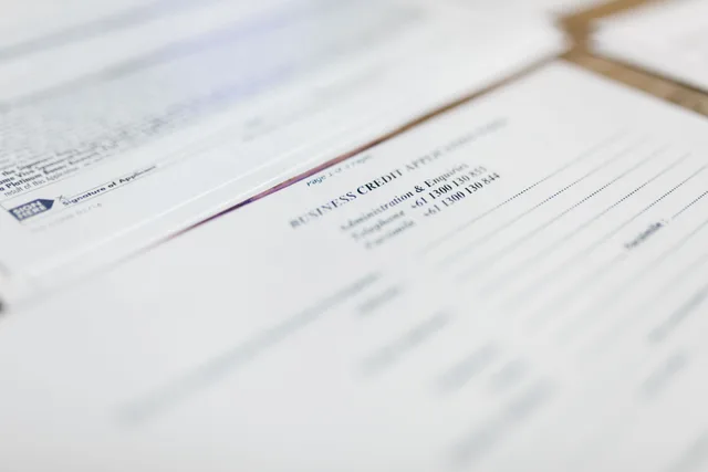 Focused image of business credit application papers, ideal for finance themes. How to keep apartment EV charging rebate records without overpromising
