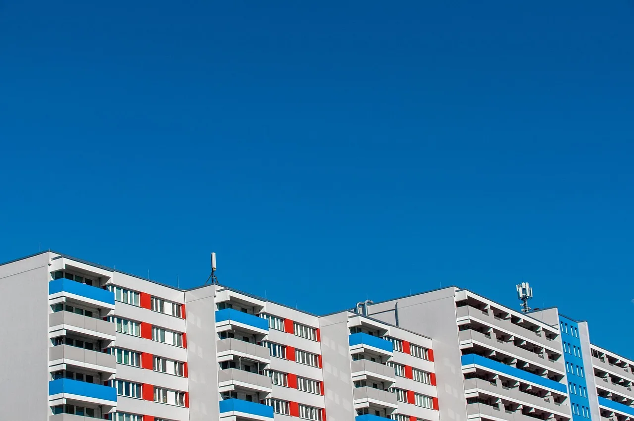 residential building, apartment building, building, facade, architecture, apartments, property. Apartment EV pilot data boundaries: what your records show and what they leave out