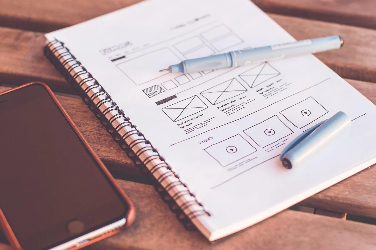 plans, design, web design, designer, desk, document, drawing, iphone, notebook, paper, pen, sketching, design, design, web design, web design, web design, web design, web design, designer. EV charging roadmap decision gates: a planning framework