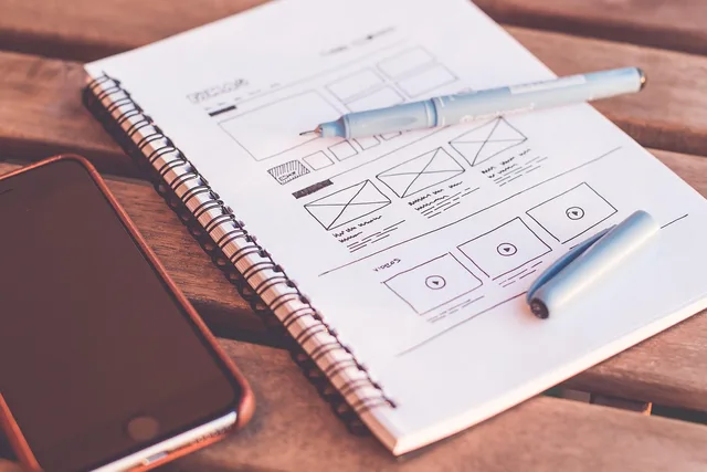 plans, design, web design, designer, desk, document, drawing, iphone, notebook, paper, pen, sketching, design, design, web design, web design, web design, web design, web design, designer. EV charging roadmap decision gates: a planning framework