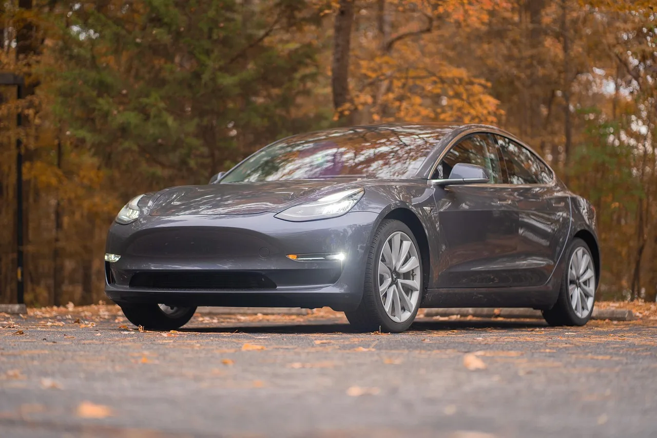 car, car wallpapers, fall, vehicle, tesla, model 3, lights, brown car. Apartment EV charging subscription terms: a 2027 checklist before you sign
